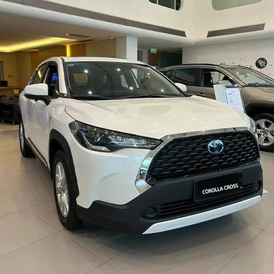 Un buon prezzo. 2024 Toyota Corolla Cross Hybrid 2.0L SUV FWD 5 posti Auto a benzina di lusso ad alta velocità Prodotta con sospensione a fascio di torsione in linea